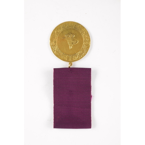 890 - A GOLD SULTAN’S MEDAL FOR EGYPT 1801 fitted with suspension loop and chain. App. Weight 29g (48mm di... 