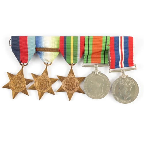 892 - A GROUP OF FIVE WW2 MEDALS comprising of a 1939-45 Star, The Atlantic Star with France and Germany c... 