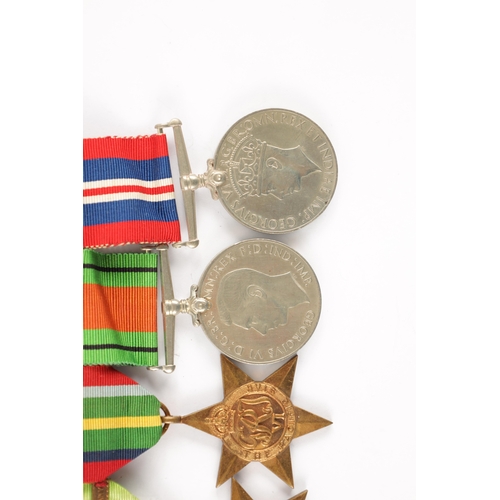 892 - A GROUP OF FIVE WW2 MEDALS comprising of a 1939-45 Star, The Atlantic Star with France and Germany c... 