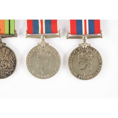 903 - TWO BRITISH WAR MEDALS 1939-45 AND TWO DEFENCE MEDALS, one war medal presented to 257458 JJ MCNANAMA... 