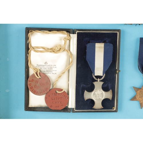 907 - A GROUP OF FIVE WW2 MEDALS in glazed case. Comprising of a Distinguished Service Cross in its origin... 