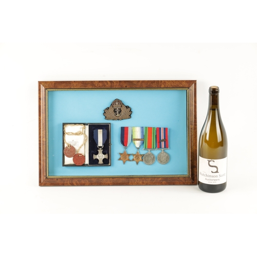 907 - A GROUP OF FIVE WW2 MEDALS in glazed case. Comprising of a Distinguished Service Cross in its origin... 