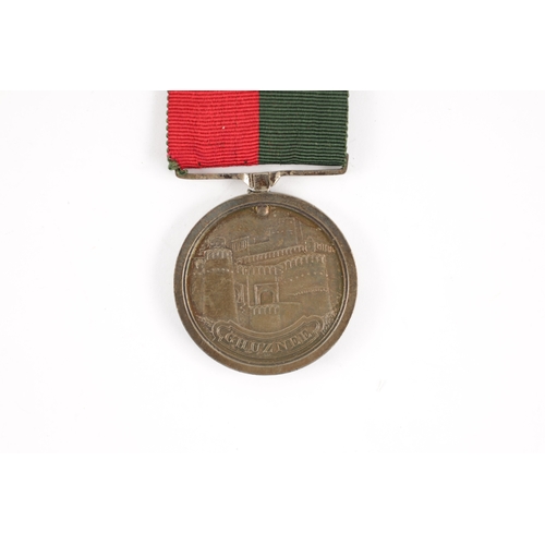 908 - A GHUZNEE MEDAL 1839 unnamed, with green and red ribbon (38mm diameter )