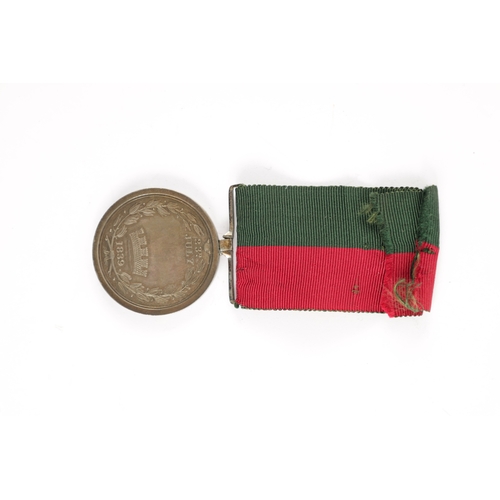 908 - A GHUZNEE MEDAL 1839 unnamed, with green and red ribbon (38mm diameter )