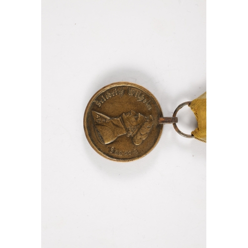 910 - A BRUNSWICK WATERLOO MEDAL 1815 presented to HEINR. LUEDDECKE. TRAINE, with suspension loop and yell... 