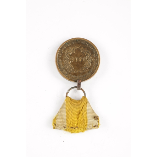 910 - A BRUNSWICK WATERLOO MEDAL 1815 presented to HEINR. LUEDDECKE. TRAINE, with suspension loop and yell... 