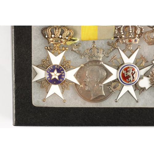 913 - A GROUP OF FOUR COMMANDER'S MEDALS comprising of Swedish Order of the North Star, Swedish Red Cross ... 