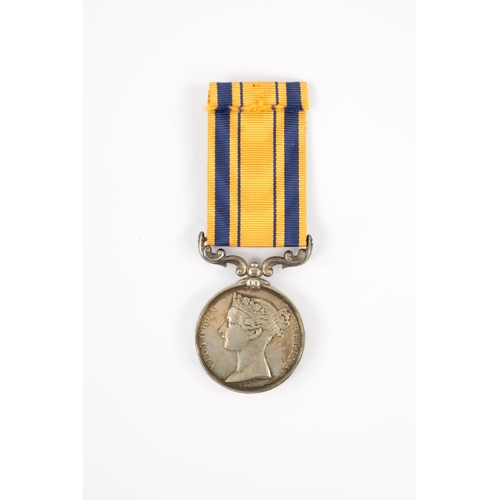 914 - A SOUTH AFRICA MEDAL 1853 presented to A. MCINTYRE. 1ST BTN. RIFLE BDE. with scroll bar suspension a... 