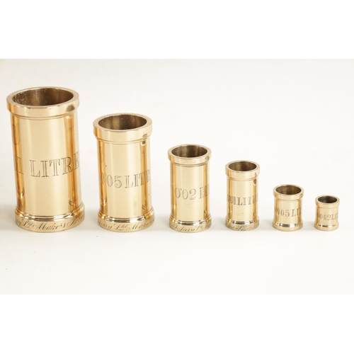 919 - A SET OF TEN BRONZE MEASURES BY W. & J. AVERY LTD. BIRMINGHAM ranging from 10 litres down to .0002 l... 