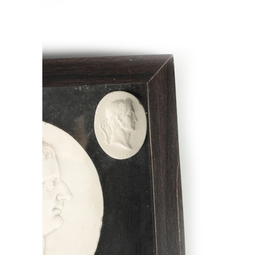 922 - A COLLECTION OF 19TH CENTURY PLASTER BUST PLAQUES depicting Roman emperors - in later glazed frame. ... 