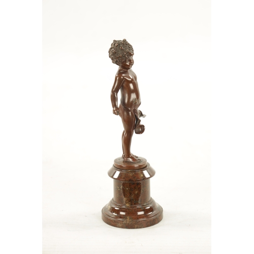 931 - A SMALL 19TH CENTURY BROWN PATINATED BRONZE OF A BOY depicted with a beetle on his belly, mounted on... 