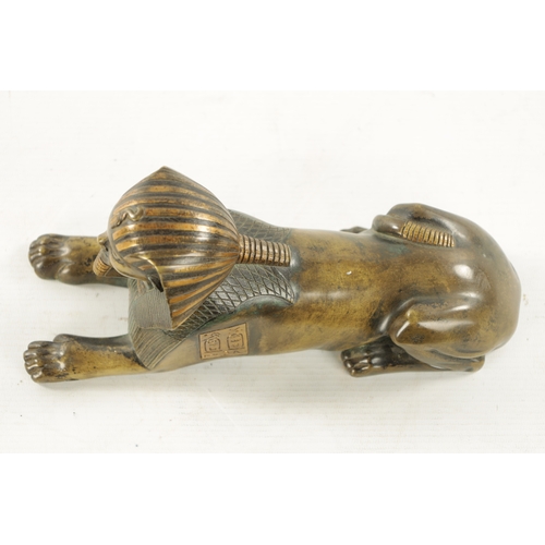 936 - A 19TH CENTURY FRENCH EGYPTIAN REVIVAL BRONZE FIGURE OF A SEATED SPHINX bearing engraved hieroglyphi... 