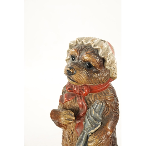 948 - A PAIR OF LATE 19TH CENTURY AUSTRIAN COLD-PAINTED TERRACOTTA MODELS OF DOGS seated with hats and one... 