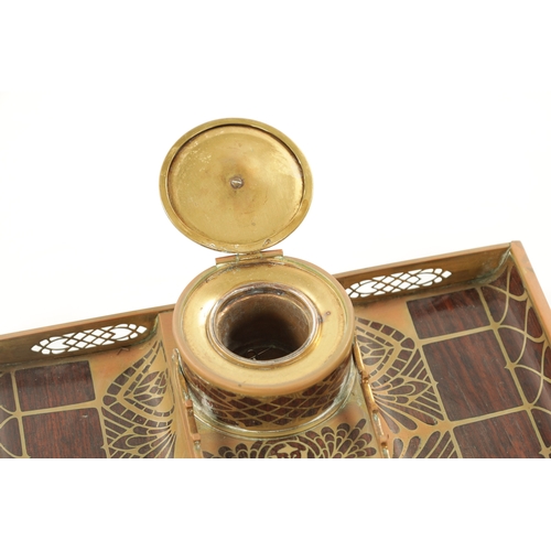 950 - ERHARD & SOHNE, A ROSEWOOD AND BRASS INLAID INK STAND of rectangular form, central circular inkwell ... 