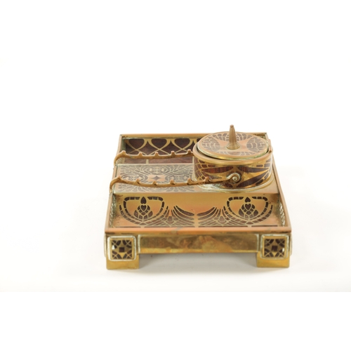 950 - ERHARD & SOHNE, A ROSEWOOD AND BRASS INLAID INK STAND of rectangular form, central circular inkwell ... 