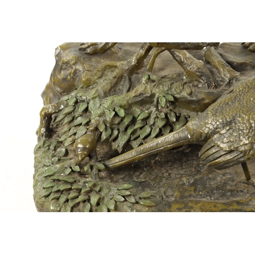 952 - JULES MOIGNIEZ (FRENCH, 1835-1894) A COLLOSAL PATINATED GREEN BRONZE ANIMALIER SCULPTURE depicting a... 