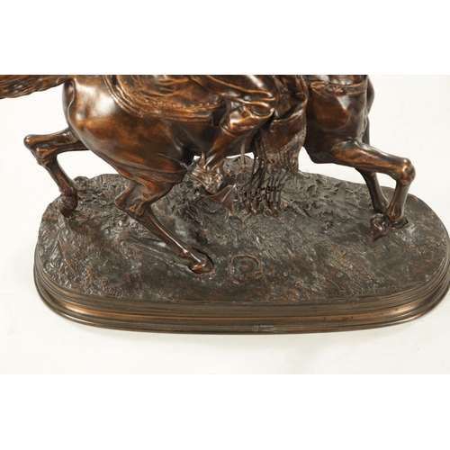 961 - AFTER P. J. MENE. A 19TH CENTURY PATINATED BRONZE SCULPTURE OF AN ARABIAN MAN ON HORSEBACK with falc... 