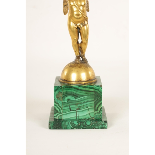 964 - A REGENCY FIGURAL GILT BRONZE, MALACHITE AND BLUE JOHN TAZZA modelled as a gilt bronze winged cherub... 