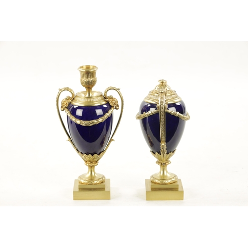 968 - A PAIR OF REGENCY ORMOLU AND PORCELAIN CASSOLETTES IN THE MANNER OF MATTHEW BOLTON having cobalt blu... 