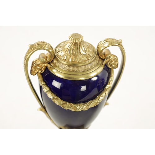 968 - A PAIR OF REGENCY ORMOLU AND PORCELAIN CASSOLETTES IN THE MANNER OF MATTHEW BOLTON having cobalt blu... 