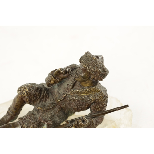 970 - A LATE 19TH CENTURY RUSSIAN BRONZE SCULPTURE ON A ROCK CRYSTAL BASE of a cossack smoking a pipe. (17... 