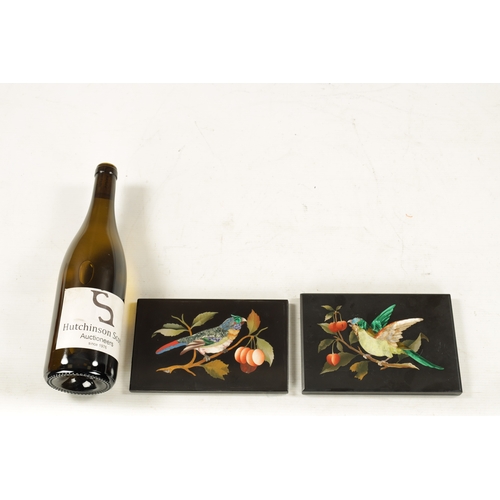 976 - A PAIR OF ITALIAN PIETRA DURA MARBLE PANELS depicting birds in branch work (13cm high 18.5cm wide )