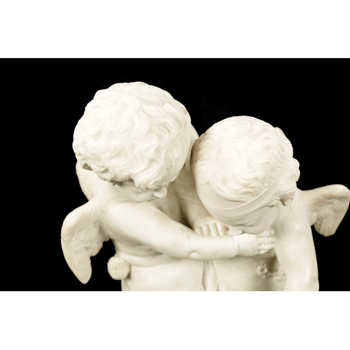 989 - A LATE 19TH CENTURY CARVED MARBLE GROUP OF TWO CHERUBS (46cm high)