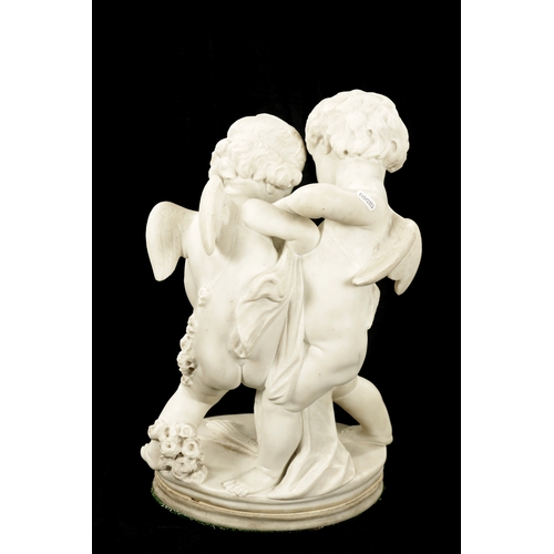 989 - A LATE 19TH CENTURY CARVED MARBLE GROUP OF TWO CHERUBS (46cm high)