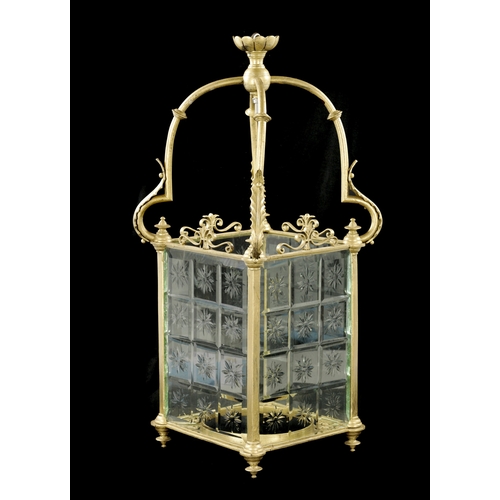 992 - A 19TH CENTURY BRASS HANGING HALL LANTERN with etched, cut glass panels and leaf cast frame (73cm hi... 