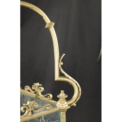 992 - A 19TH CENTURY BRASS HANGING HALL LANTERN with etched, cut glass panels and leaf cast frame (73cm hi... 