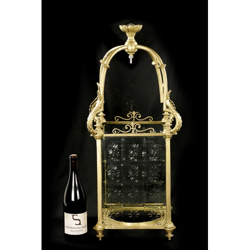 992 - A 19TH CENTURY BRASS HANGING HALL LANTERN with etched, cut glass panels and leaf cast frame (73cm hi... 