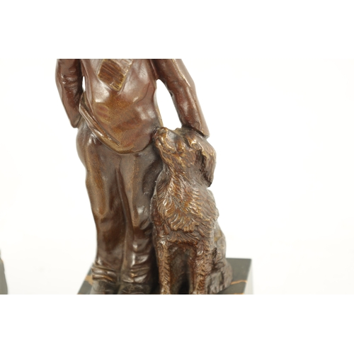 997 - A PAIR OF ARTS AND CRAFTS BRONZE AND IVORY FIGURES depicting a boy and his dog and a boy playing a s... 