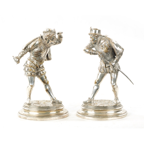 998 - EMILE GUILLEMIN. A PAIR OF SILVERED BRONZE SCULPTURES DEPICTING CAVALIERS on oval moulded bases - si... 