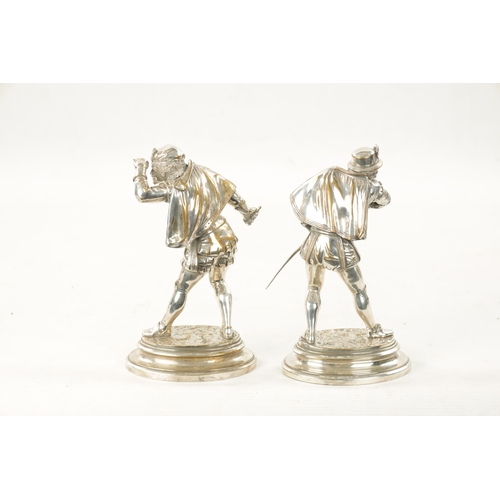 998 - EMILE GUILLEMIN. A PAIR OF SILVERED BRONZE SCULPTURES DEPICTING CAVALIERS on oval moulded bases - si... 