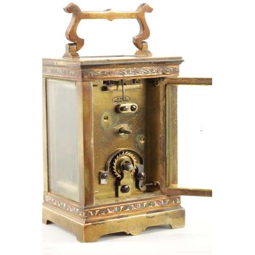 1197 - A LATE 19TH CENTURY FRENCH CHAMPLEVE ENAMEL CARRIAGE CLOCK having a masked enamel dial fronting an e... 