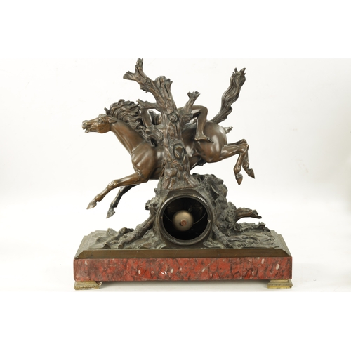 1209 - A LARGE LATE 19TH CENTURY FRENCH BRONZE AND ROUGE MARBLE MANTEL CLOCK modelled as a semi-nude man ri... 