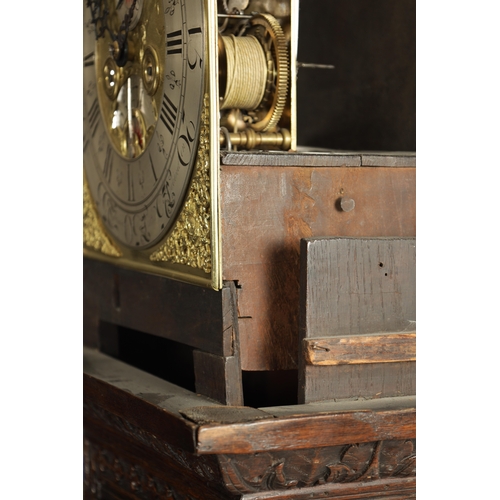 1215 - THOMAS LISTER, LUDDENDEN. A MID 18TH CENTURY EIGHT-DAY BRASS DIAL MOON ROLLER LONGCASE CLOCK the 12