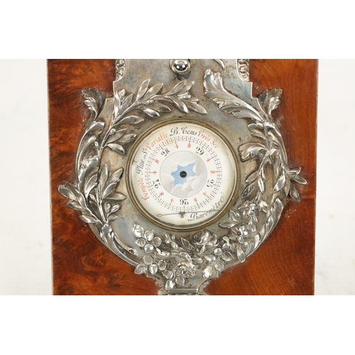 1248 - AN EARLY 20TH CENTURY SILVERED BRONZE BAROMETER mounted on a burr elm base (25.5cm high)