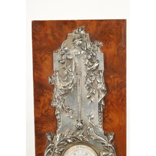 1248 - AN EARLY 20TH CENTURY SILVERED BRONZE BAROMETER mounted on a burr elm base (25.5cm high)