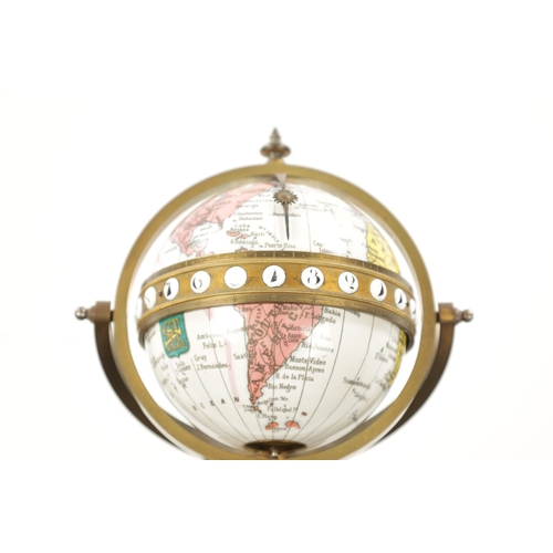 1250 - ANTOINE REDIER, PARIS. A LATE 19TH CENTURY ROTATING ENAMEL GLOBE CLOCK the gimballed brass stand wit... 