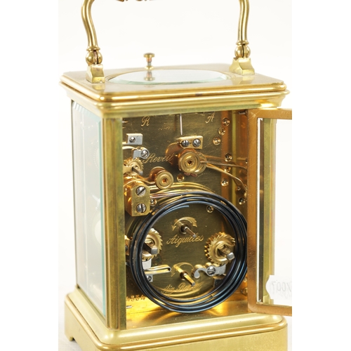 1256 - A LATE 19TH CENTURY FRENCH BRASS CASED GRAND SONNERIE CARRIAGE CLOCK the gilt masked enamel dial wit... 