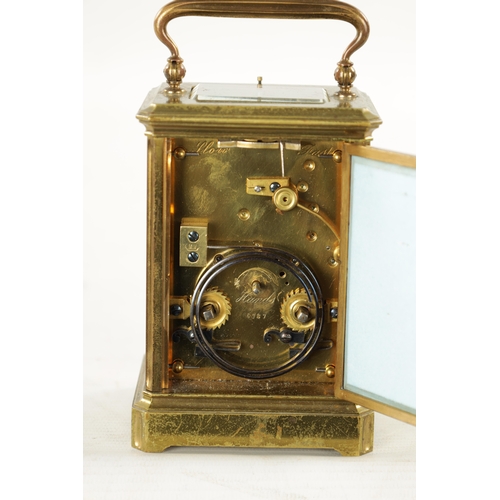 1281 - A LATE 19TH CENTURY FRENCH PORCELAIN PANELLED REPEATING CARRIAGE CLOCK the brass case with canted co... 