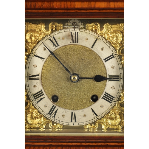 1289 - A LATE 19TH CENTURY GERMAN ORMOLU MOUNTED WALNUT BRACKET CLOCK the square brass dial with gilt shell... 