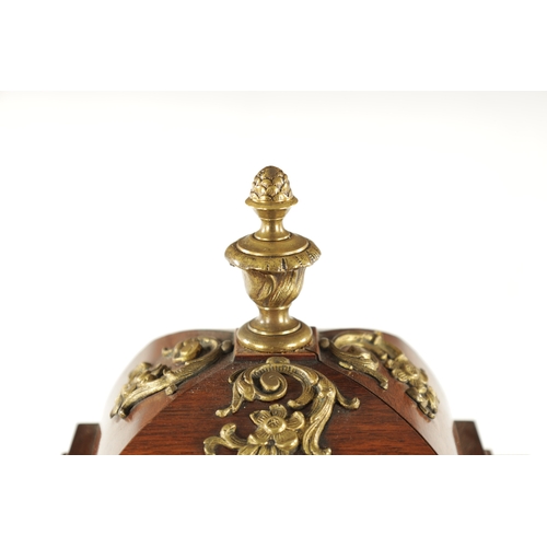 1289 - A LATE 19TH CENTURY GERMAN ORMOLU MOUNTED WALNUT BRACKET CLOCK the square brass dial with gilt shell... 