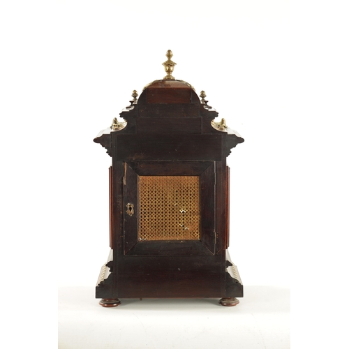 1289 - A LATE 19TH CENTURY GERMAN ORMOLU MOUNTED WALNUT BRACKET CLOCK the square brass dial with gilt shell... 