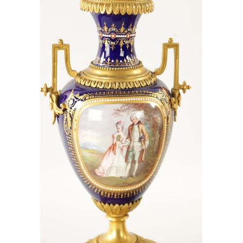 1299 - A FINE 19TH CENTURY FRENCH ORMOLU AND SEVRES PORCELAIN CLOCK GARNITURE the case surmounted by a larg... 