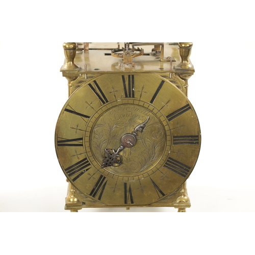 1303 - JOSEPH WINDMILLS, LONDON. A LATE 17TH CENTURY WINGED LANTERN CLOCK. Surmounted by a large bell above... 