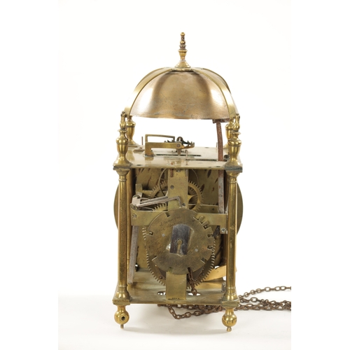 1303 - JOSEPH WINDMILLS, LONDON. A LATE 17TH CENTURY WINGED LANTERN CLOCK. Surmounted by a large bell above... 