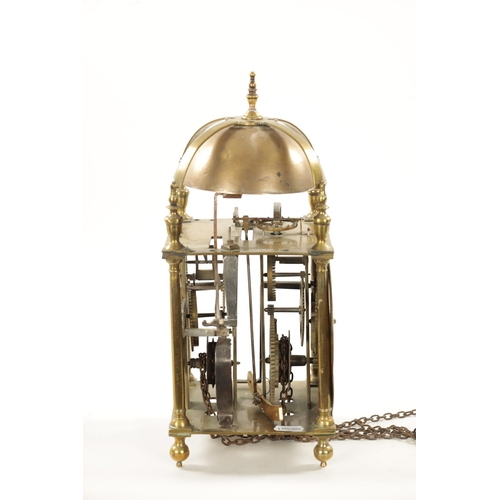 1303 - JOSEPH WINDMILLS, LONDON. A LATE 17TH CENTURY WINGED LANTERN CLOCK. Surmounted by a large bell above... 