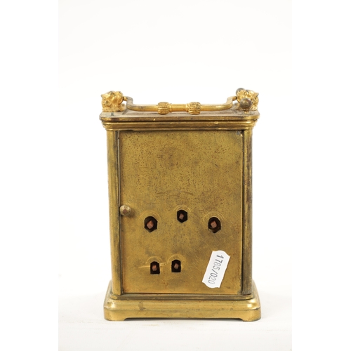 1307 - A MID 19TH CENTURY STRIKING CARRIAGE CLOCK WITH CALENDAR the gilt brass case with lion head handle m... 